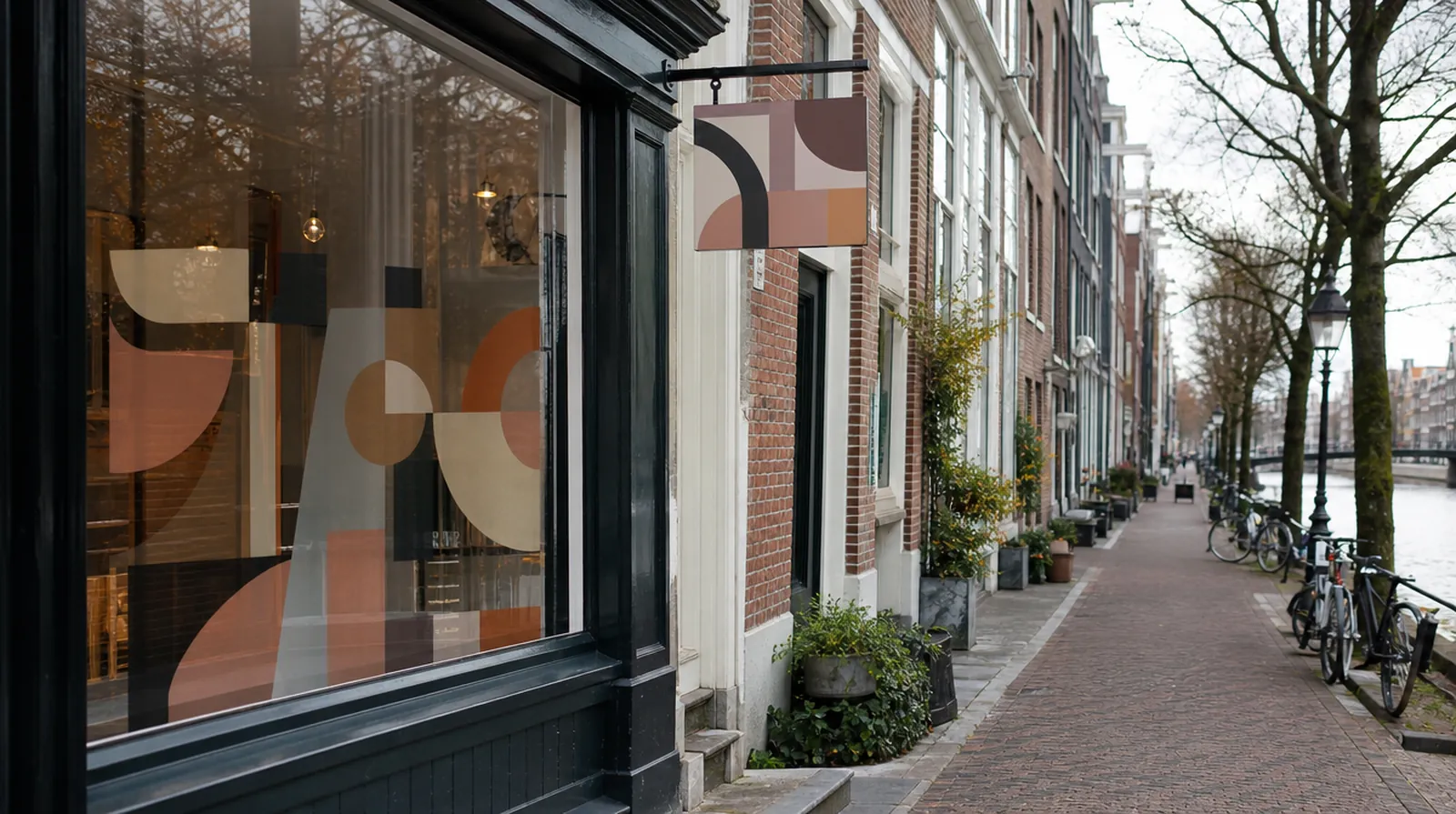 Shop window film and blade sign on a Dutch canal street